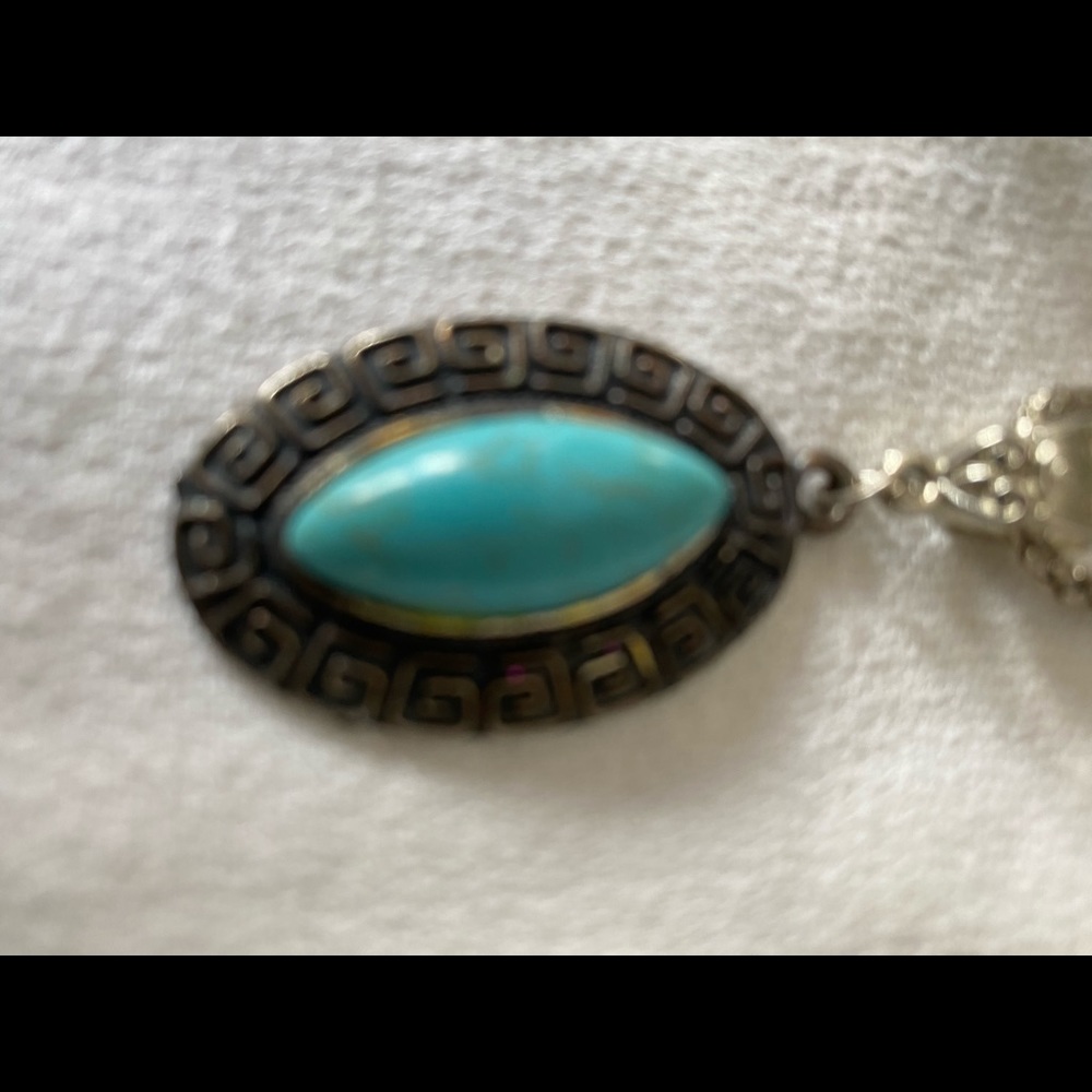 18” silver chain with turquoise color pendant